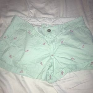 Teal shorts with pink anchors